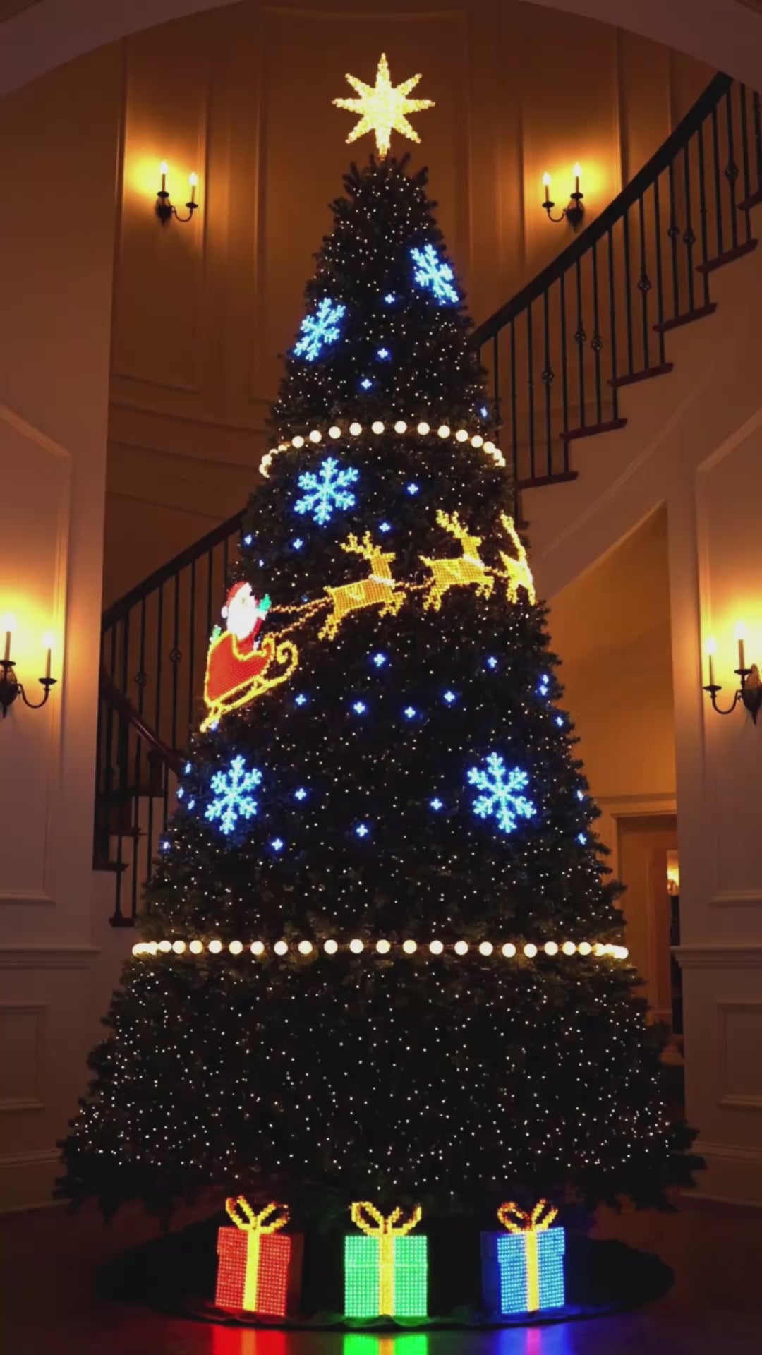 Christmas tree lit up with animated LED light designs